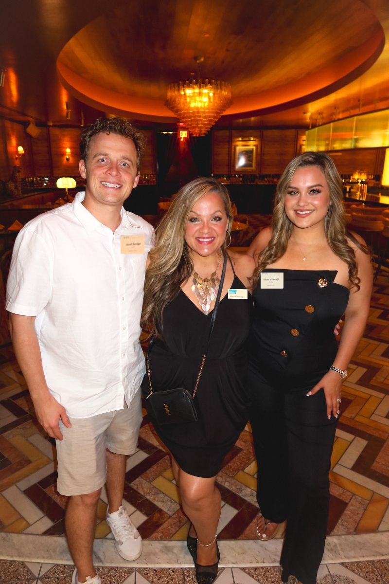 Three_people_at_an_event